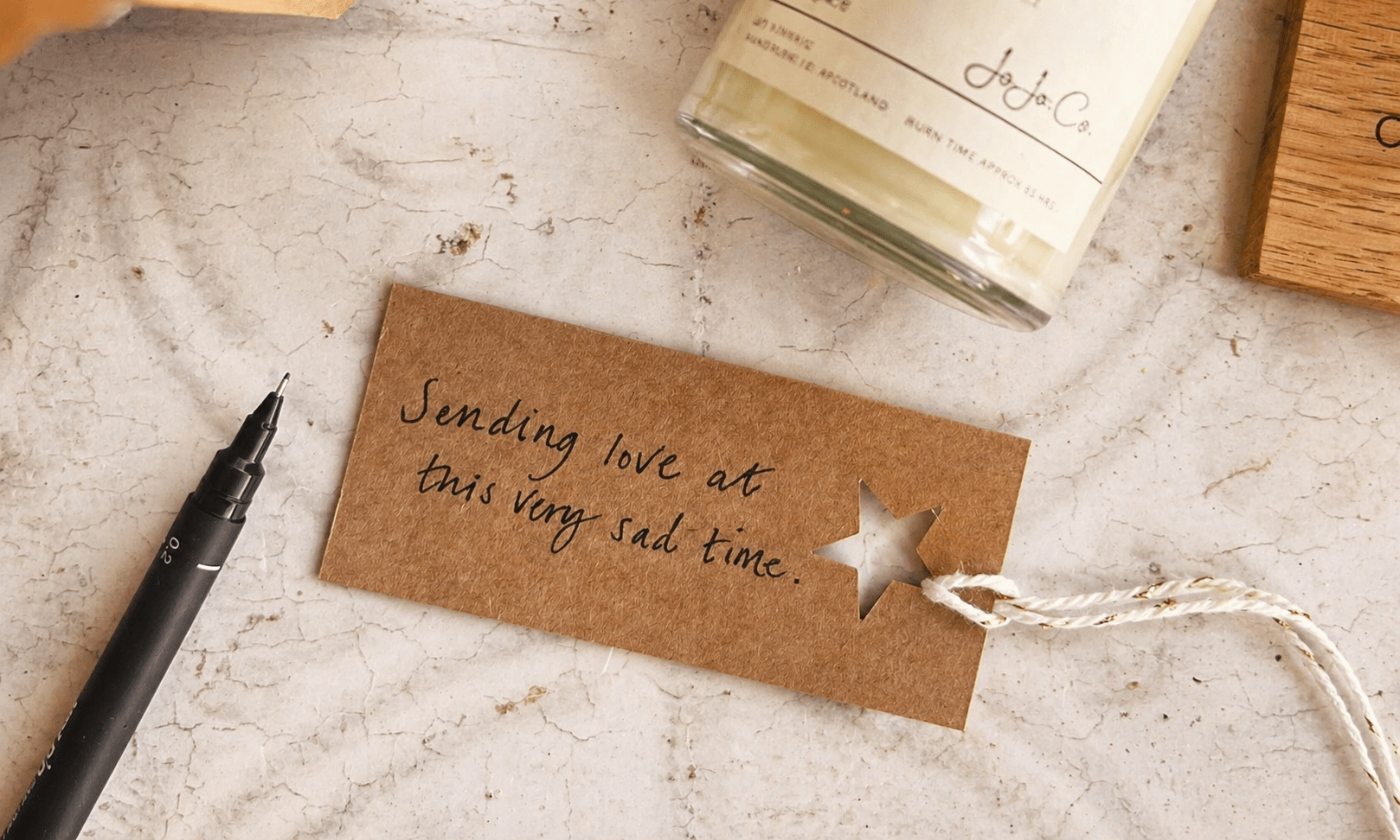 a thoughtful bereavement gift with a handwritten card