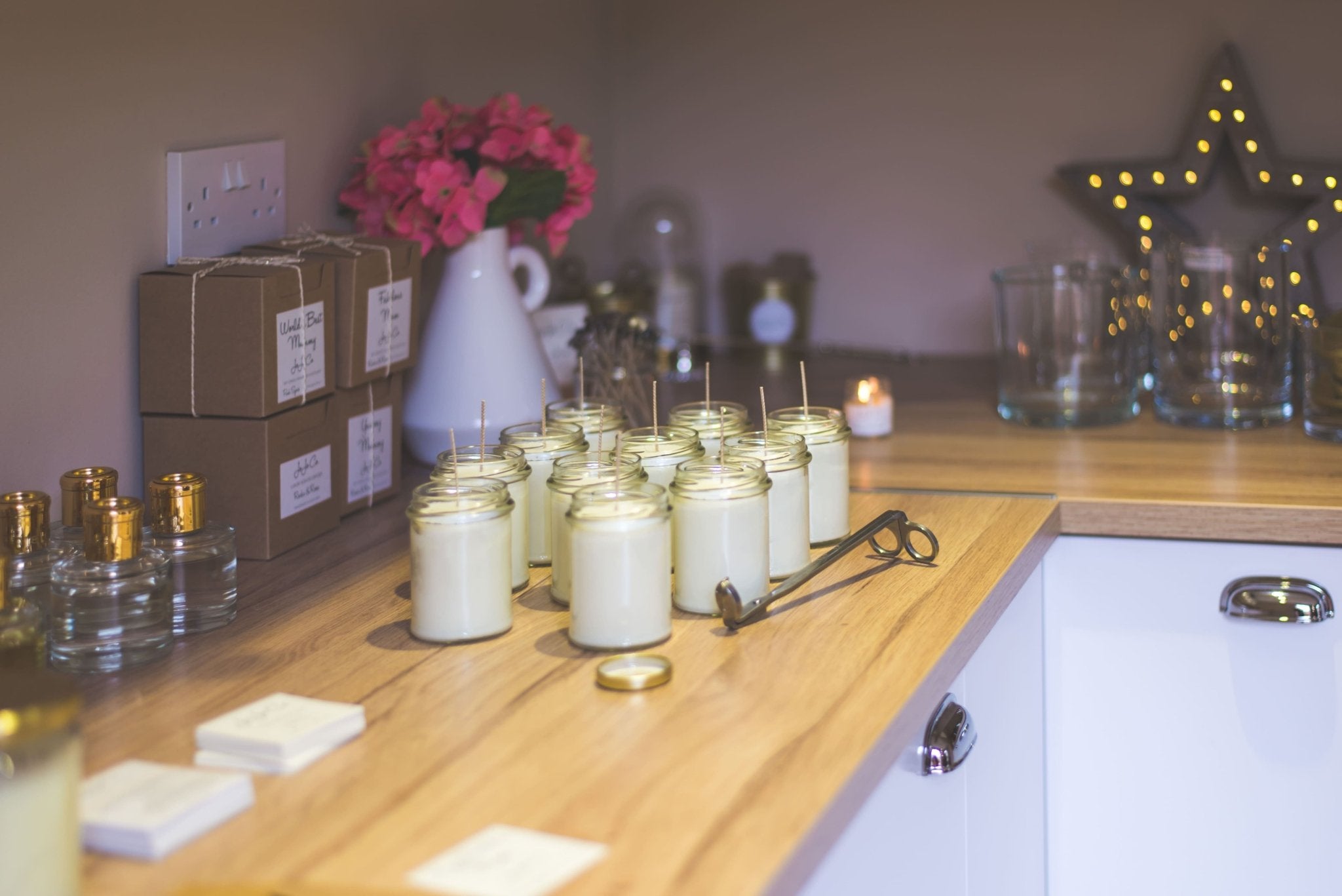 A collection of handmade soy candles by JoJo Co., handcrafted in Scotland and showcasing the quality, craftsmanship and luxury of artisan candle making.