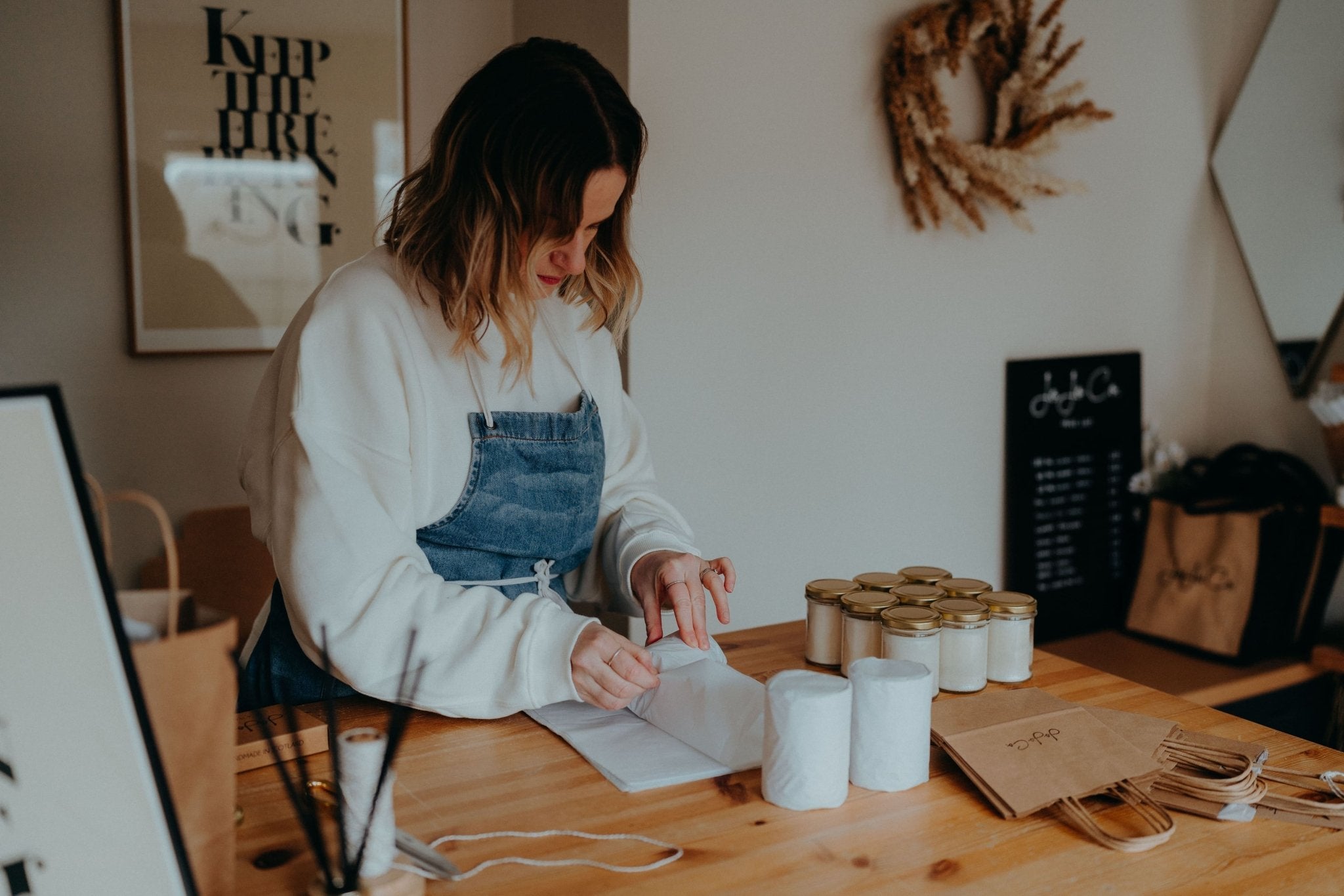 Jo, founder of JoJo Co., writing a small business blog about handmade candles, SEO, customer connection and running a creative business in Scotland.