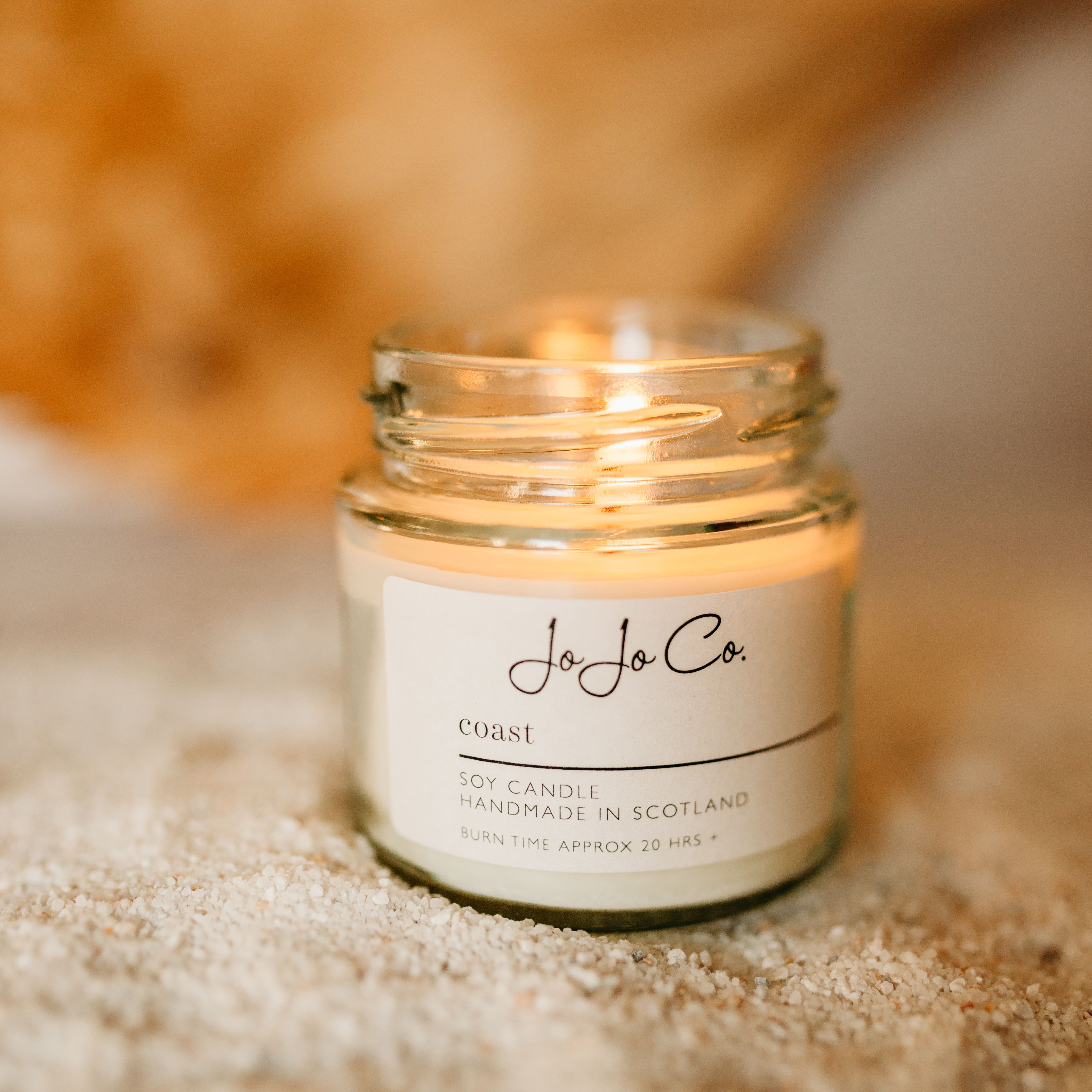 JoJo Co Coast candle in a glass jar