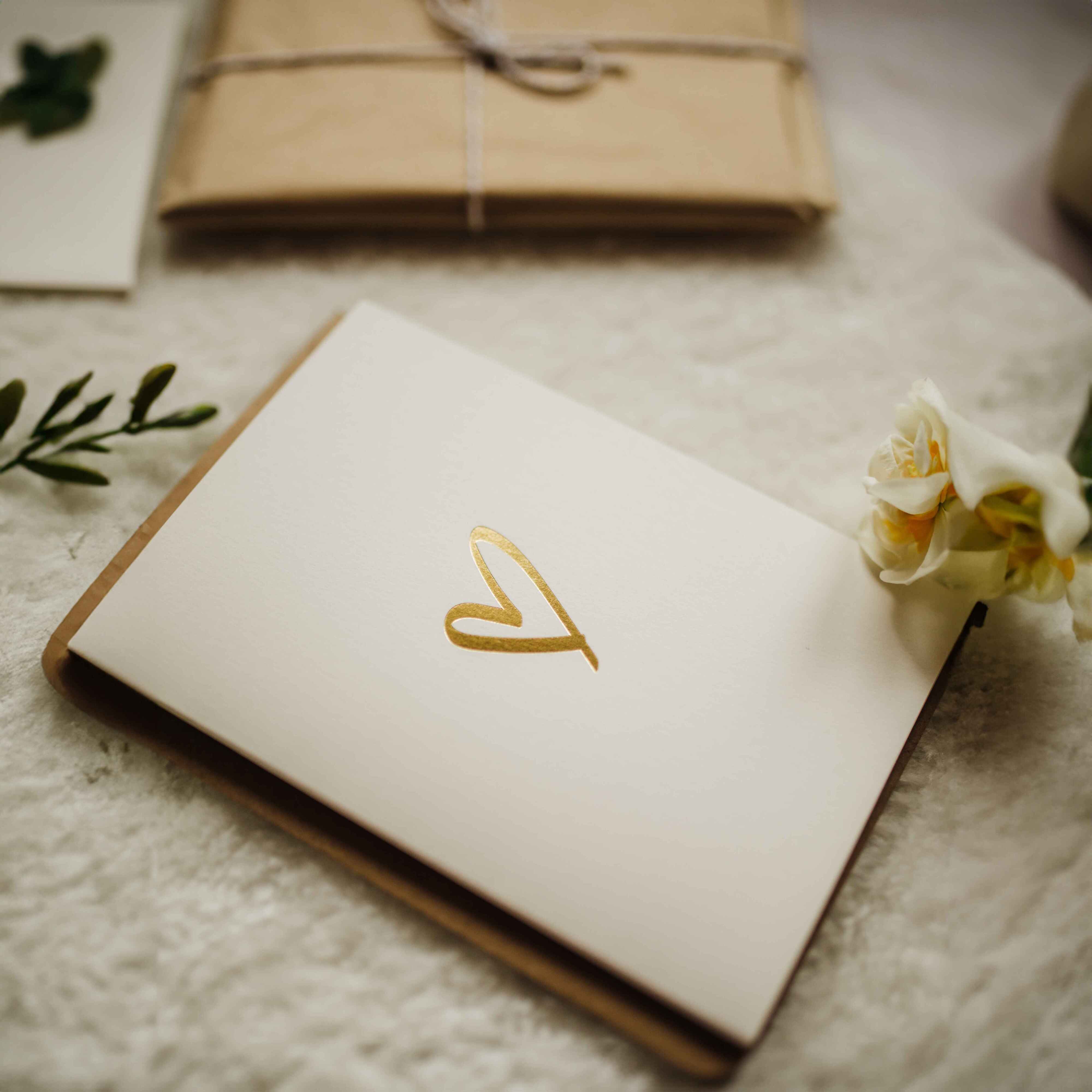 Luxury card with gold embossed heart