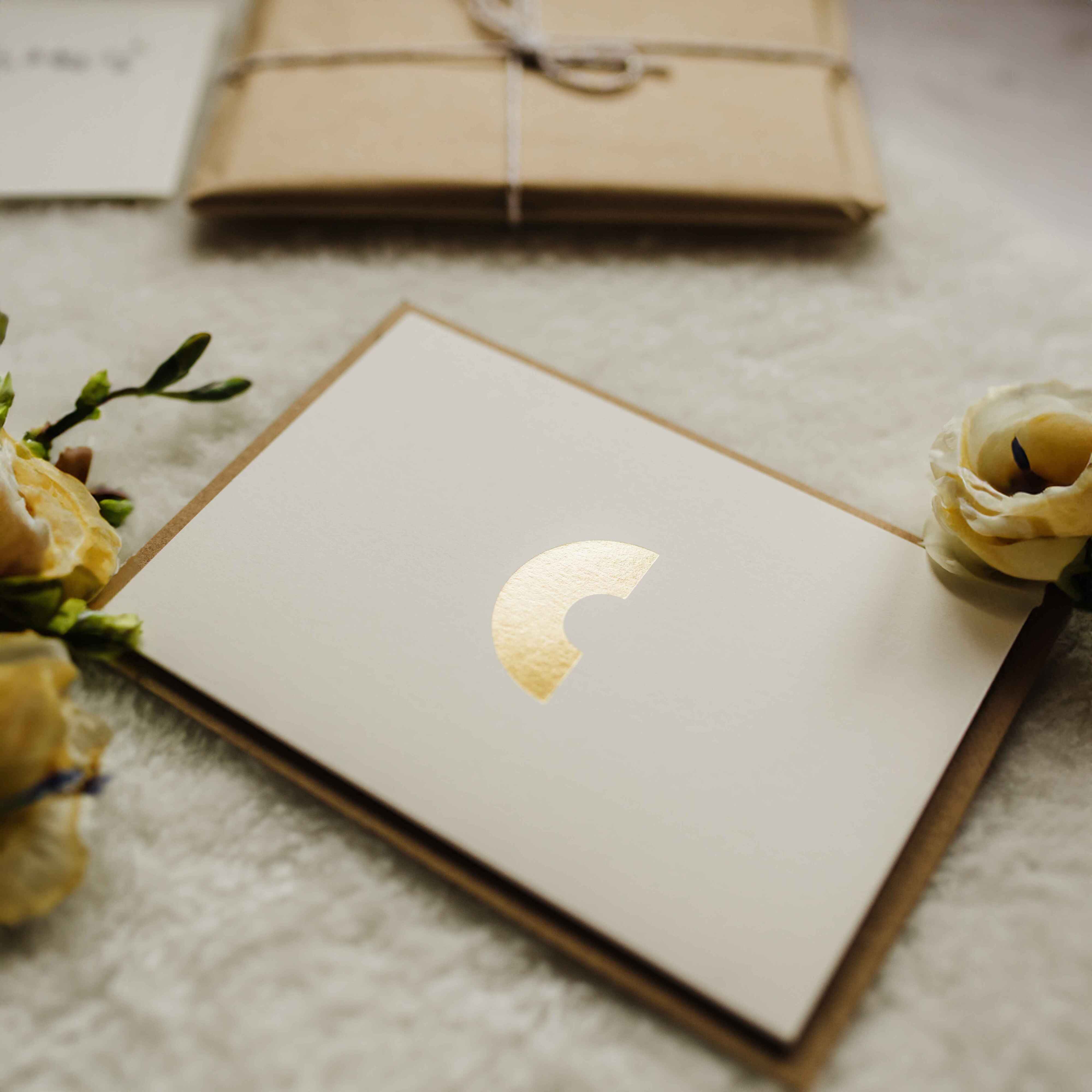Cream card with gold rainbow