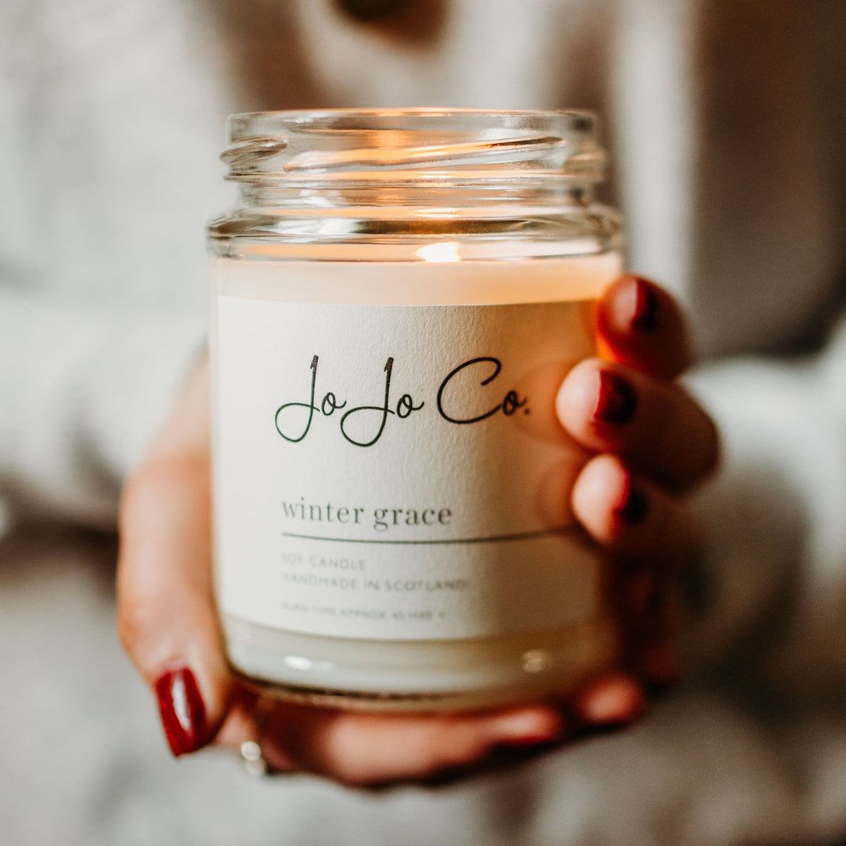 JoJo Co. Winter Grace scented candle creating a cosy autumn evening in Scotland 